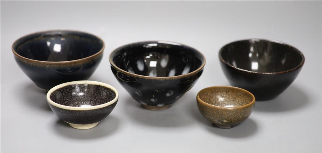 Five Chinese tenmoku glazed bowls, tallest 7cm